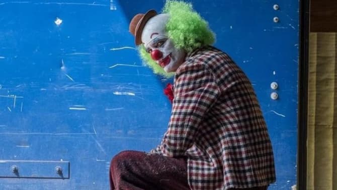 JOKER Set Photos Show Joaquin Phoenix's Clown Prince Of Crime Running Through Gotham City